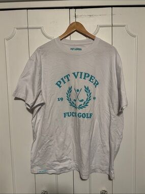 Pit Viper White Tee with Teal Crest Graphic and Bold Text